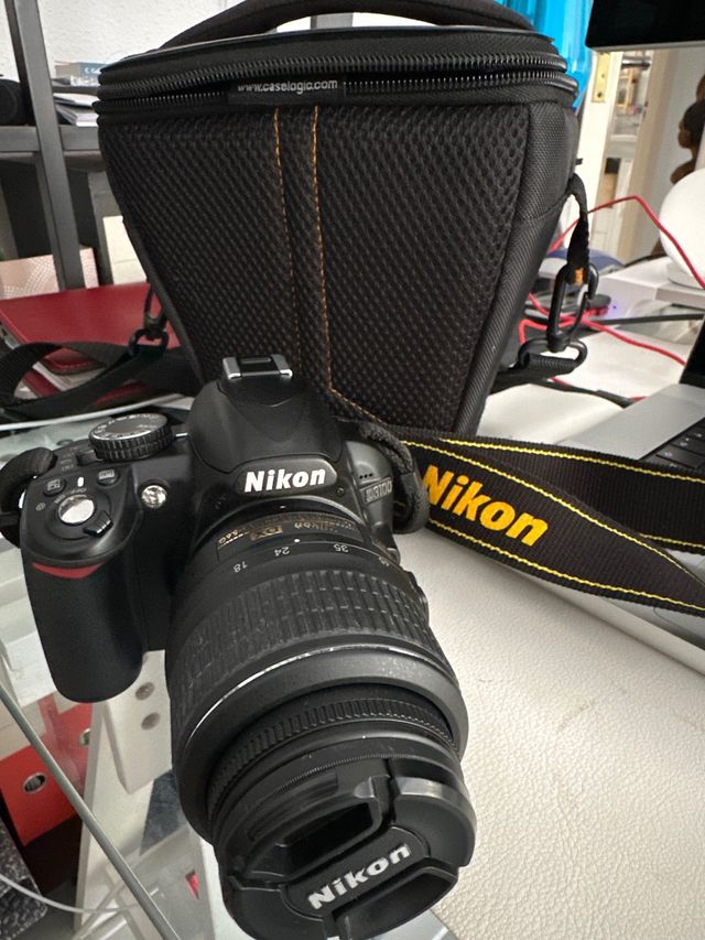 Magnifica cámara de fotos Nikon D3100