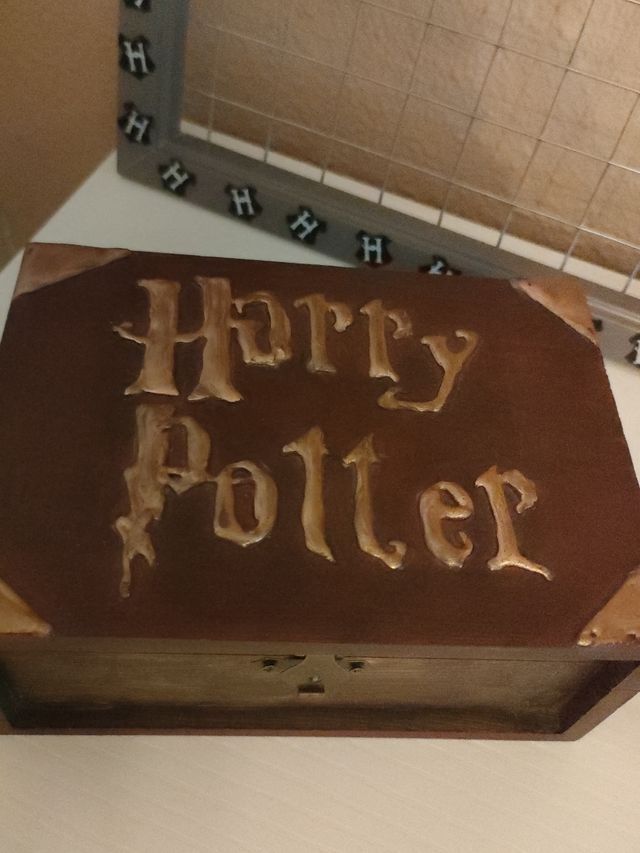 Caja y cuelga fotos Harry Potter