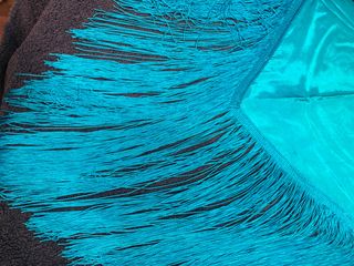 Pico azul con flecos, 3€