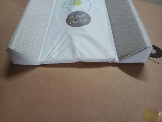 CAMBIADOR ACOLCHADO NUEVO .-