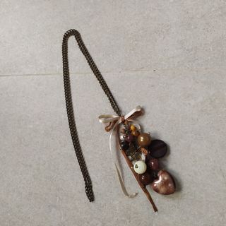 1€: Collar abalorios marrón