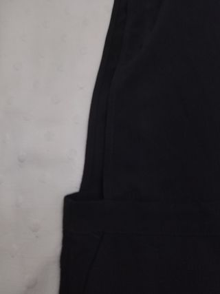 Pero/Buzo/Mono color negro. Fino