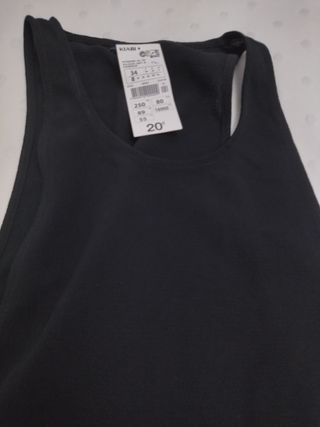 Pero/Buzo/Mono color negro. Fino