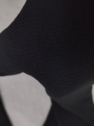 Pero/Buzo/Mono color negro. Fino