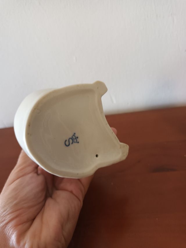 Pareja de figuras GDR porcelana.