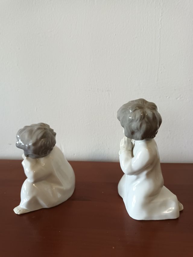 Pareja de figuras GDR porcelana.