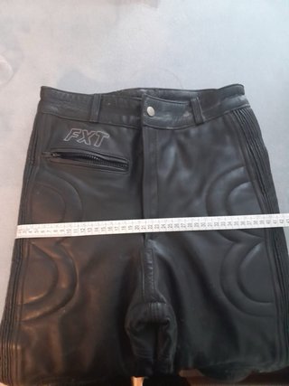 traje moto cuero