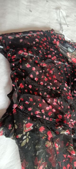 Camisa negra transparente de mujer