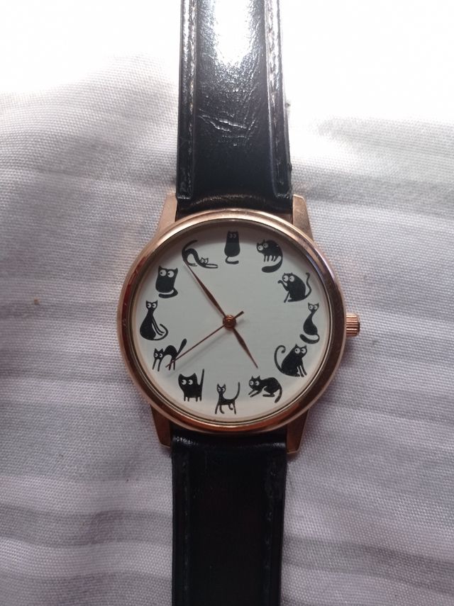 Reloj gatos