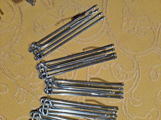 Ganci e tende da soffitto plissettati. (Prezzo: 30 unità)