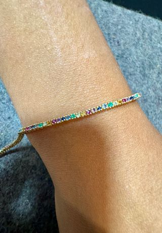 Pulsera riviere de 18 kt con zafiros, rubíes...
