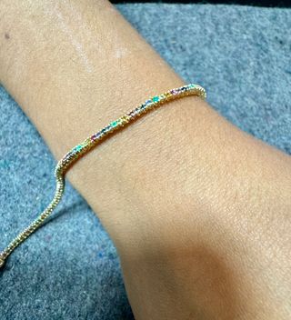 Pulsera riviere de 18 kt con zafiros, rubíes...