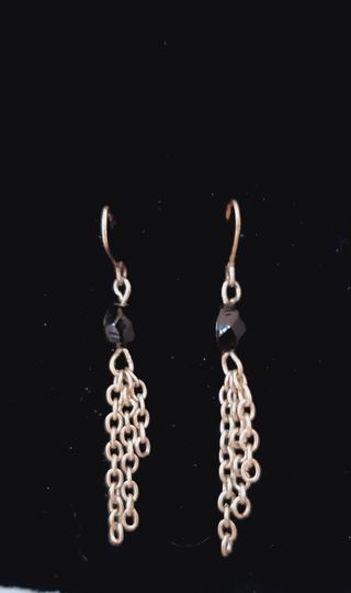 Conjunto collar largo y pendientes plateados