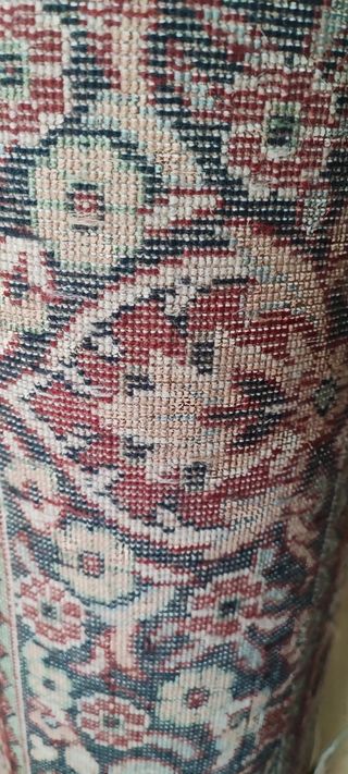 Alfombra prácticamente nueva