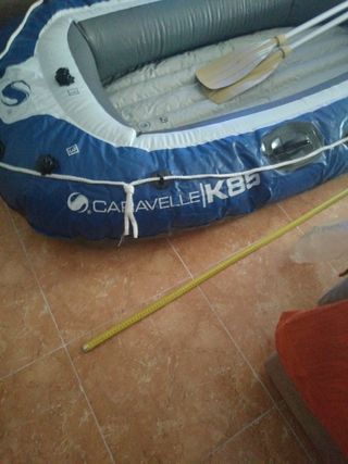 barca hinchable con dos remos