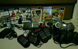 Consola PlayStation2 con accesorios