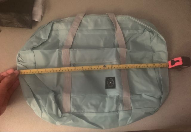 Bolsa de viaje color azul cyan