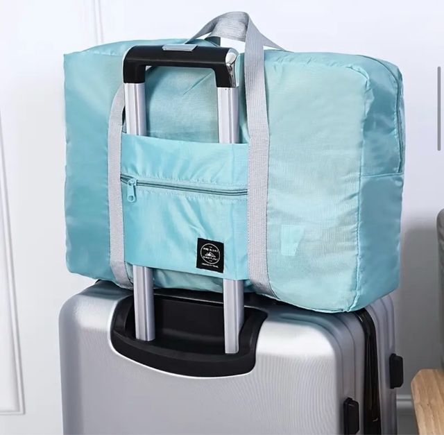 Bolsa de viaje color azul cyan