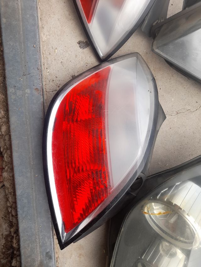 Faros Opel Astra 2005 delanteros y trase
