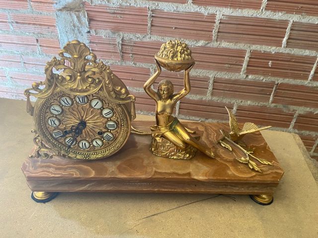 reloj de bronce