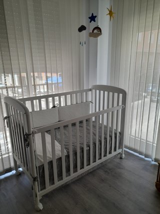 cuna blanca.