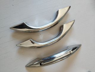 3 Tiradores de aluminio