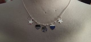 Collar de plata 925 mls con figuras. 