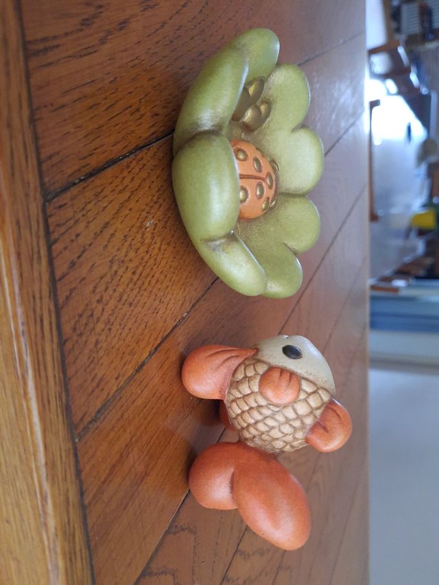 Thun : pesciolino e fiore con coccinella