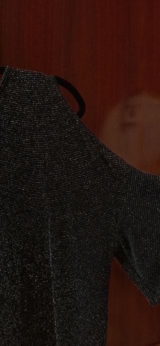 Blusa de fiesta negra con brillos. Amichi