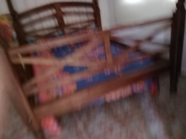 Cama de matrimonio antigua