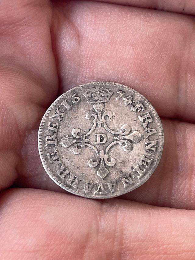 4 soles con cruz floral, Francia , 1674