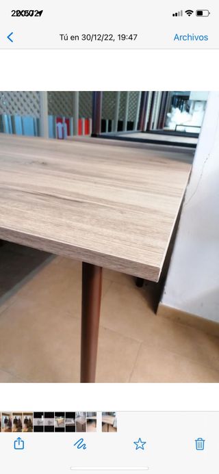 mesas de hierro y parte de arriba de madera