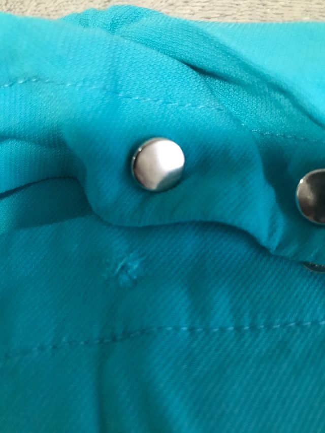 Mono azul turquesa de Tintoretto talla 38