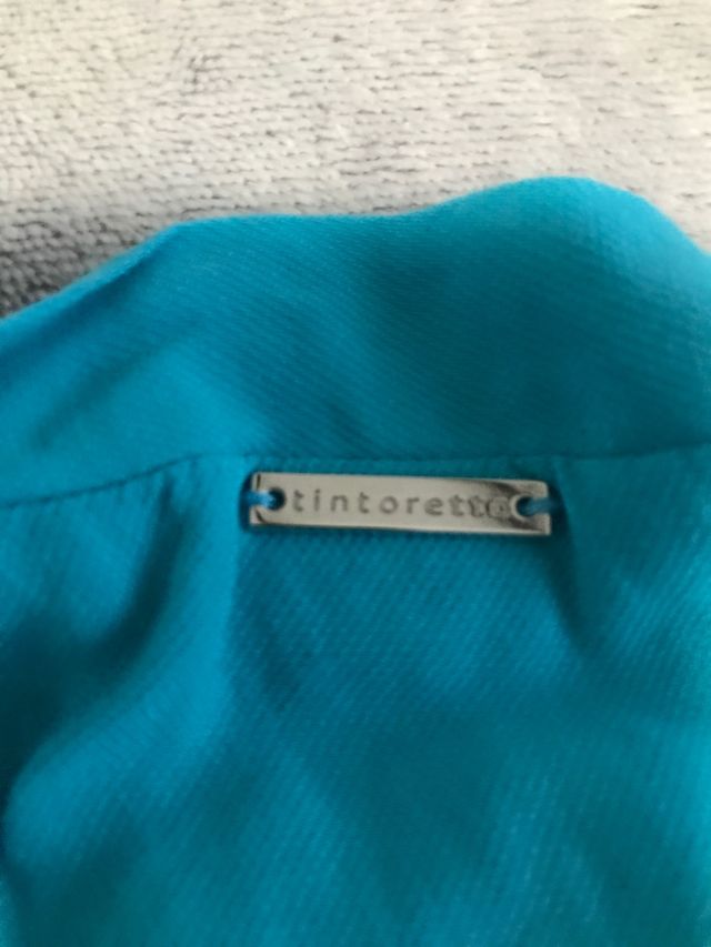 Mono azul turquesa de Tintoretto talla 38