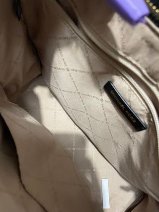 Bolso MK de color marron y negro