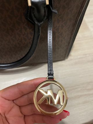 Bolso MK de color marron y negro