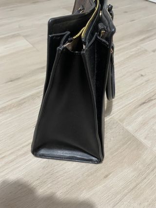 Bolso MK de color marron y negro