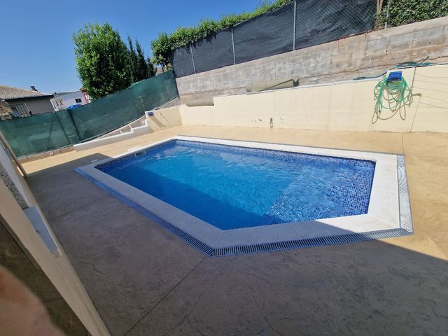 Hormigón impreso fachada piscinas