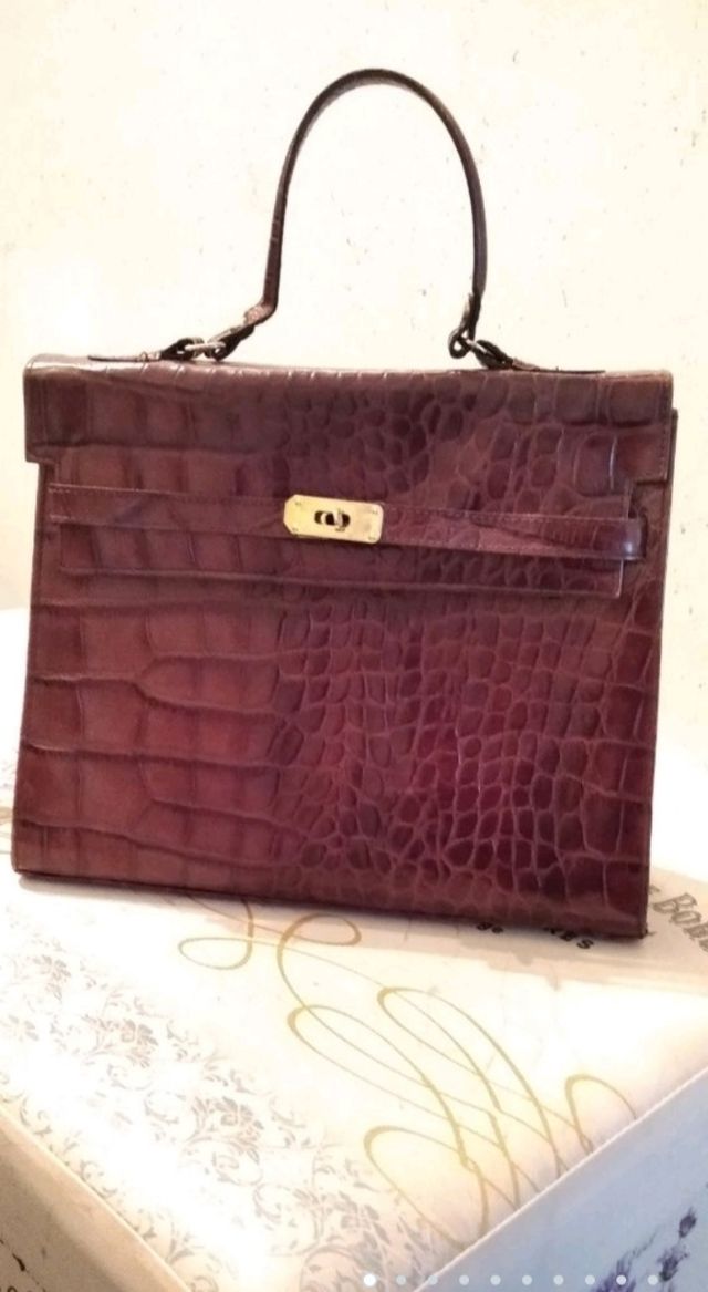 Bolsos peleteria Coco... Serp... Abrigo y Parka.