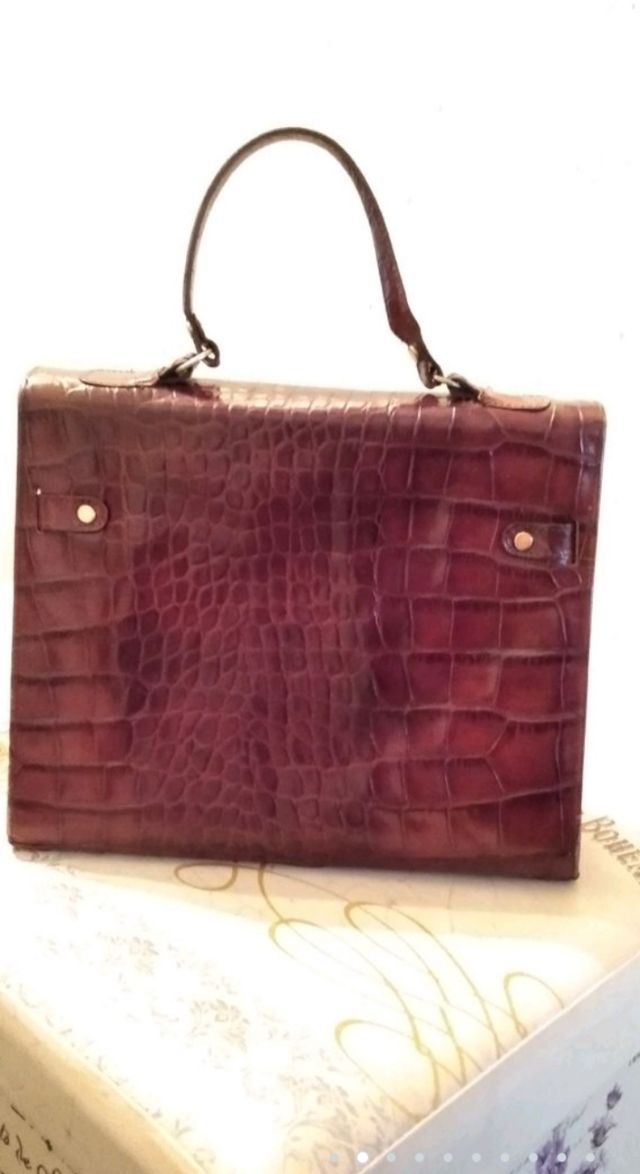 Bolsos peleteria Coco... Serp... Abrigo y Parka.