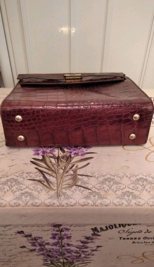 Bolsos peleteria Coco... Serp... Abrigo y Parka.