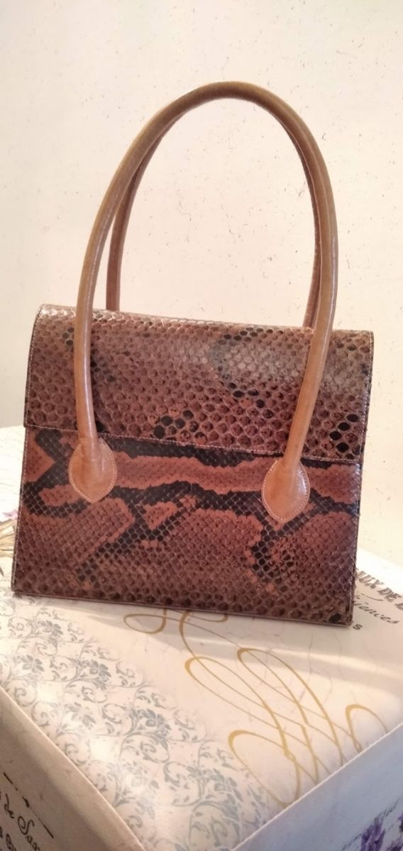 Bolsos peleteria Coco... Serp... Abrigo y Parka.