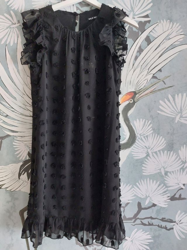 Vestido marca Wild Ponny. Relieves de circulos. S