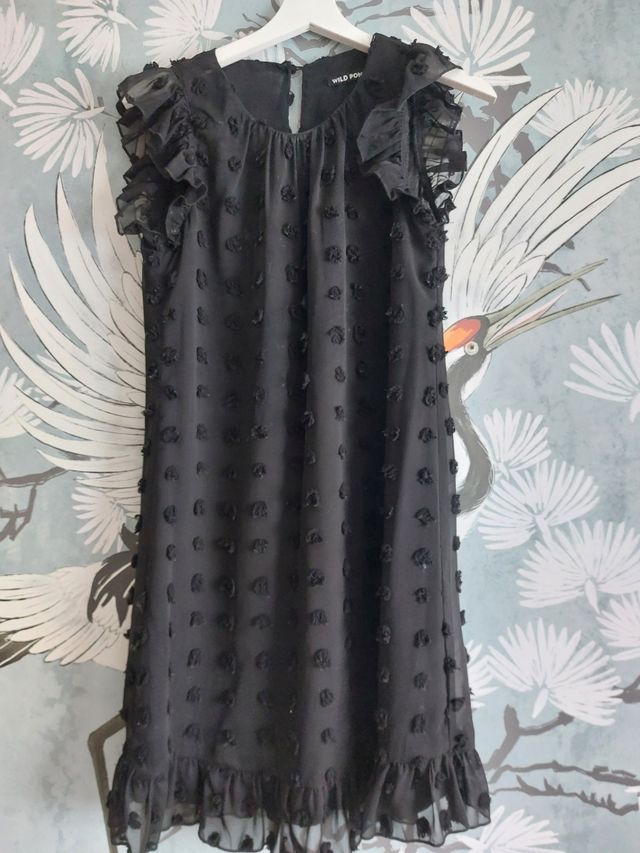 Vestido marca Wild Ponny. Relieves de circulos. S