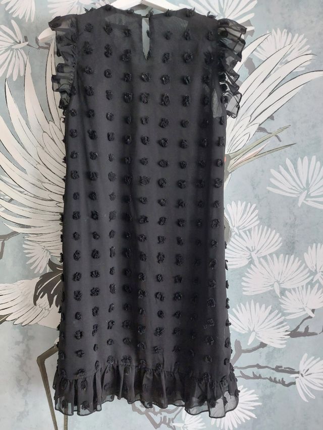 Vestido marca Wild Ponny. Relieves de circulos. S