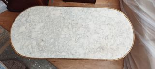 Mesa baja de salón de bronce y mármol