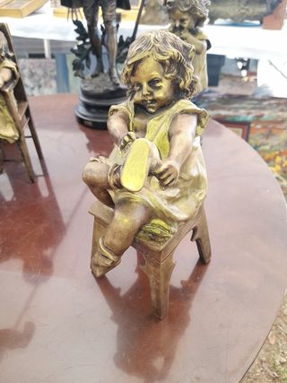 Figura bronce