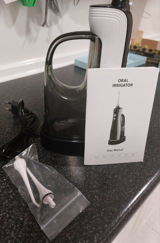 Irrigador dental
