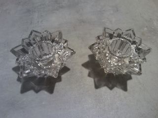 Dos candelabros forma de estrella