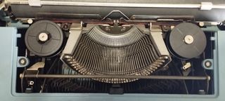 Maquina escribir olivetti 46
